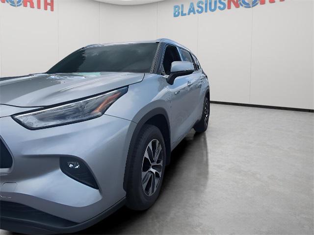 used 2021 Toyota Highlander Hybrid car, priced at $27,950