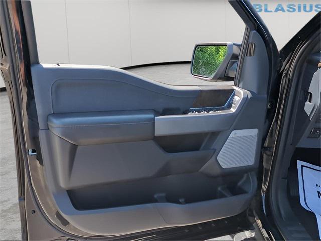 used 2023 Ford F-150 Lightning car, priced at $46,356