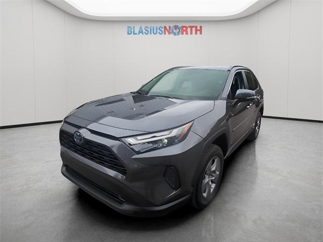 used 2024 Toyota RAV4 Hybrid car, priced at $30,000