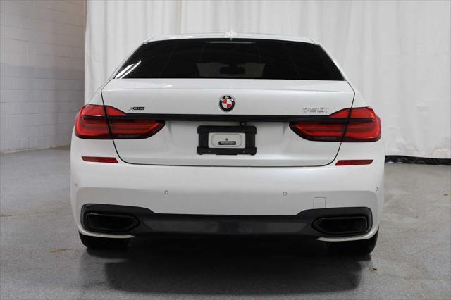 used 2016 BMW 750 car, priced at $21,550