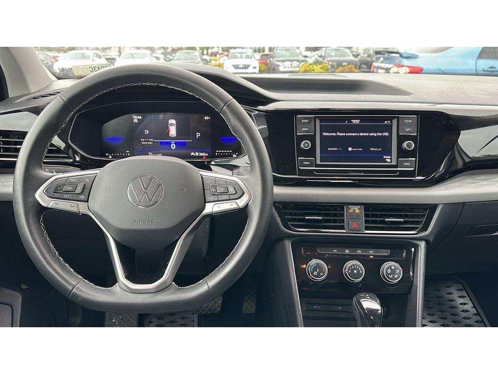 used 2023 Volkswagen Taos car, priced at $20,503