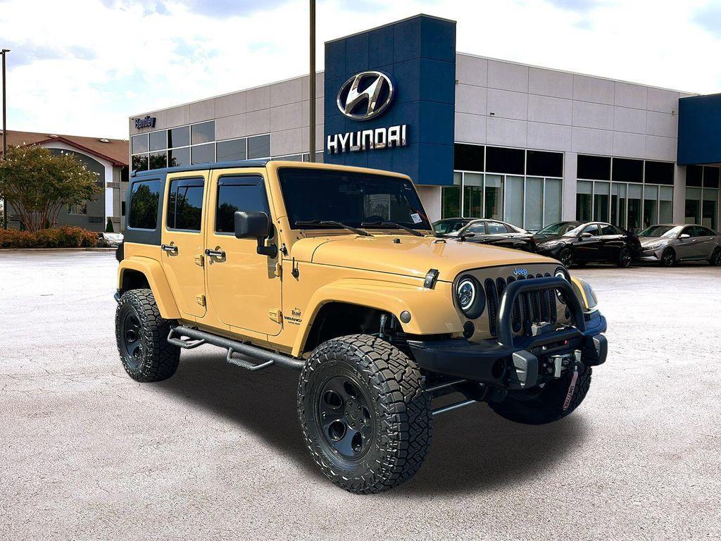 used 2013 Jeep Wrangler Unlimited car, priced at $20,990