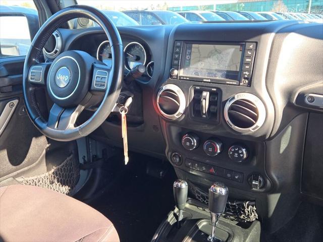 used 2014 Jeep Wrangler Unlimited car, priced at $18,589