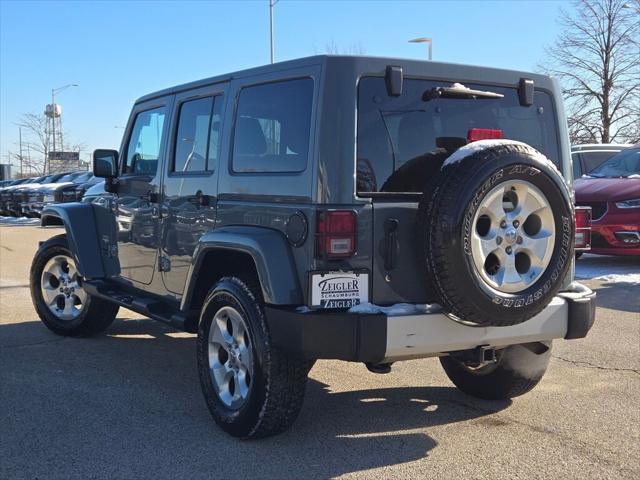 used 2014 Jeep Wrangler Unlimited car, priced at $18,589