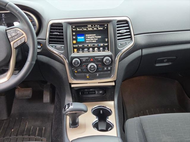 used 2014 Jeep Grand Cherokee car, priced at $10,000