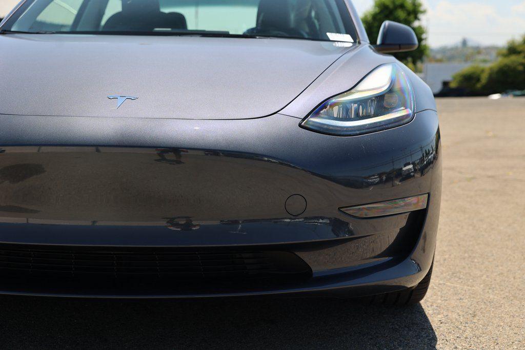 used 2023 Tesla Model 3 car, priced at $35,000