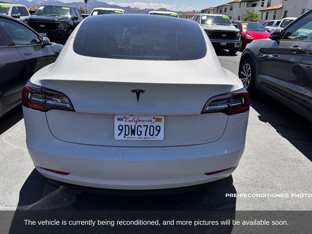 used 2023 Tesla Model 3 car, priced at $28,588