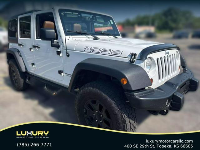 used 2013 Jeep Wrangler Unlimited car, priced at $17,995