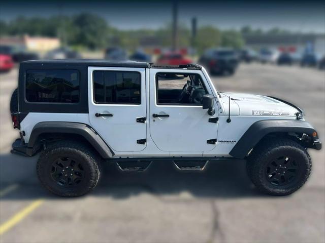used 2013 Jeep Wrangler Unlimited car, priced at $17,995