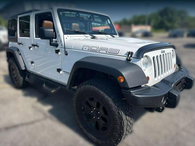 used 2013 Jeep Wrangler Unlimited car, priced at $17,995