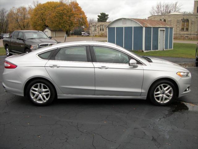 used 2015 Ford Fusion car, priced at $9,990