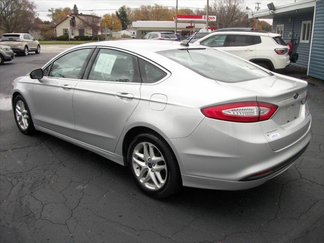 used 2015 Ford Fusion car, priced at $9,990