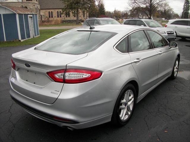 used 2015 Ford Fusion car, priced at $9,990