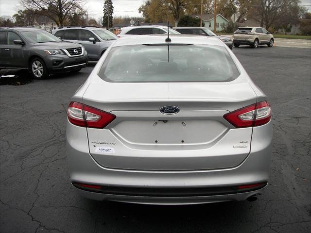 used 2015 Ford Fusion car, priced at $9,990