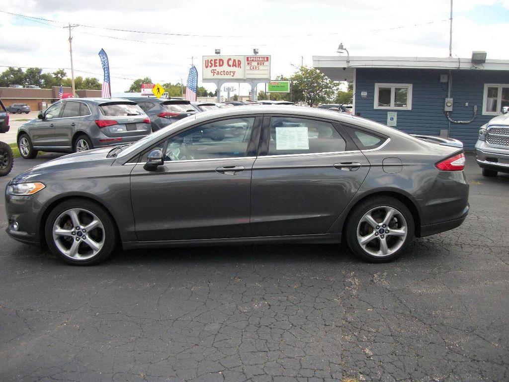 used 2016 Ford Fusion car, priced at $11,990