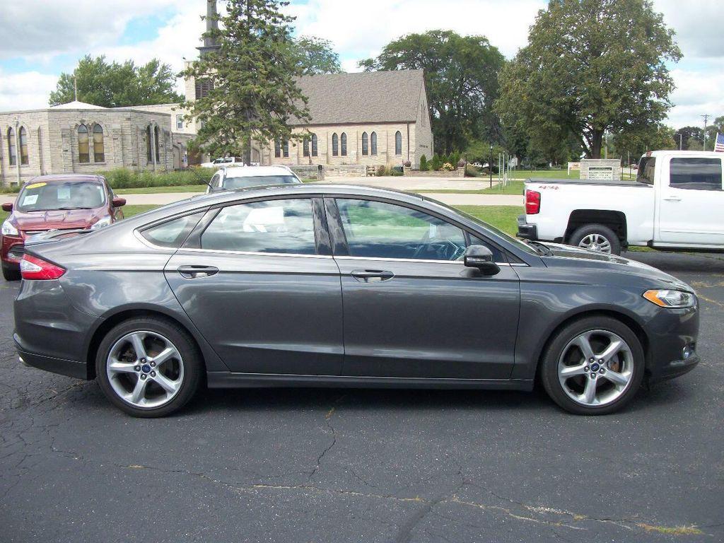 used 2016 Ford Fusion car, priced at $11,990