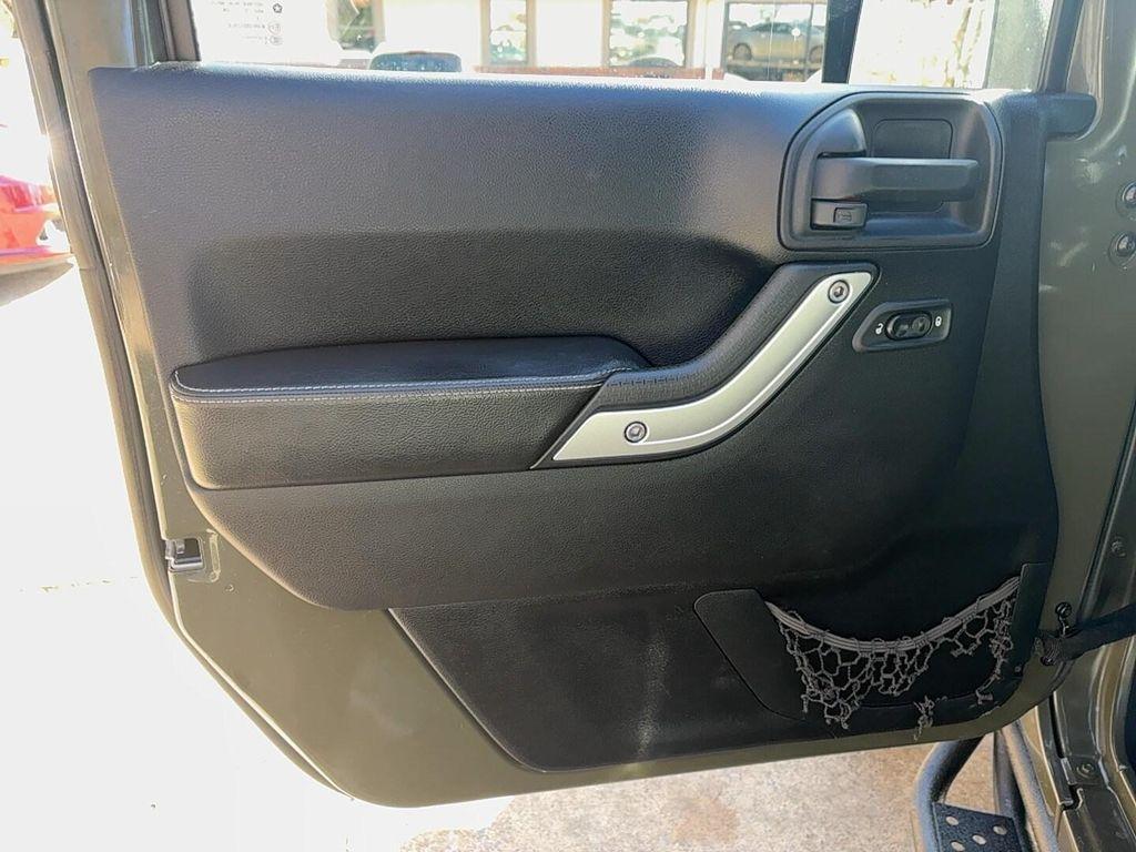 used 2015 Jeep Wrangler Unlimited car, priced at $13,900