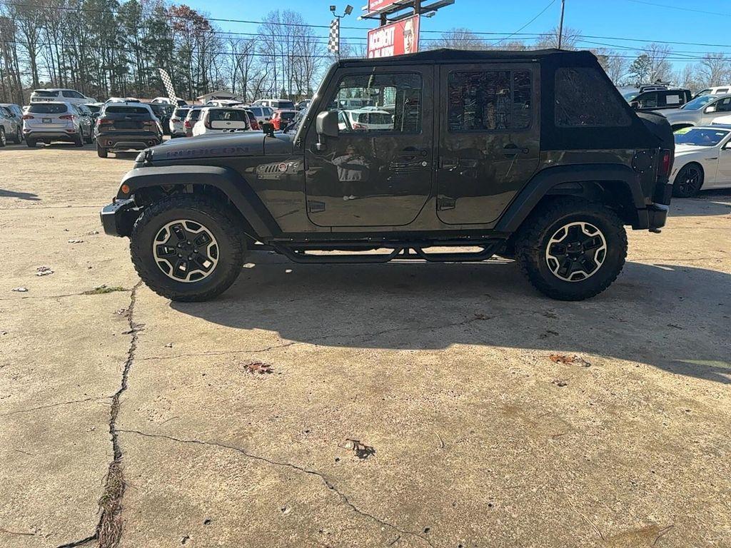 used 2015 Jeep Wrangler Unlimited car, priced at $13,900