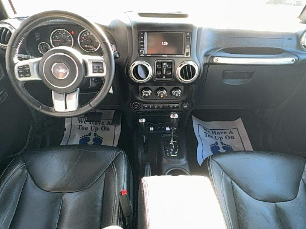 used 2015 Jeep Wrangler Unlimited car, priced at $13,900