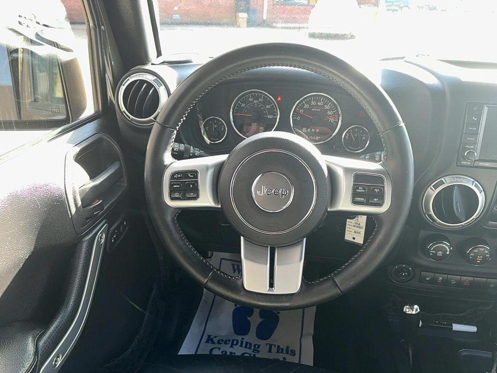 used 2015 Jeep Wrangler Unlimited car, priced at $13,900