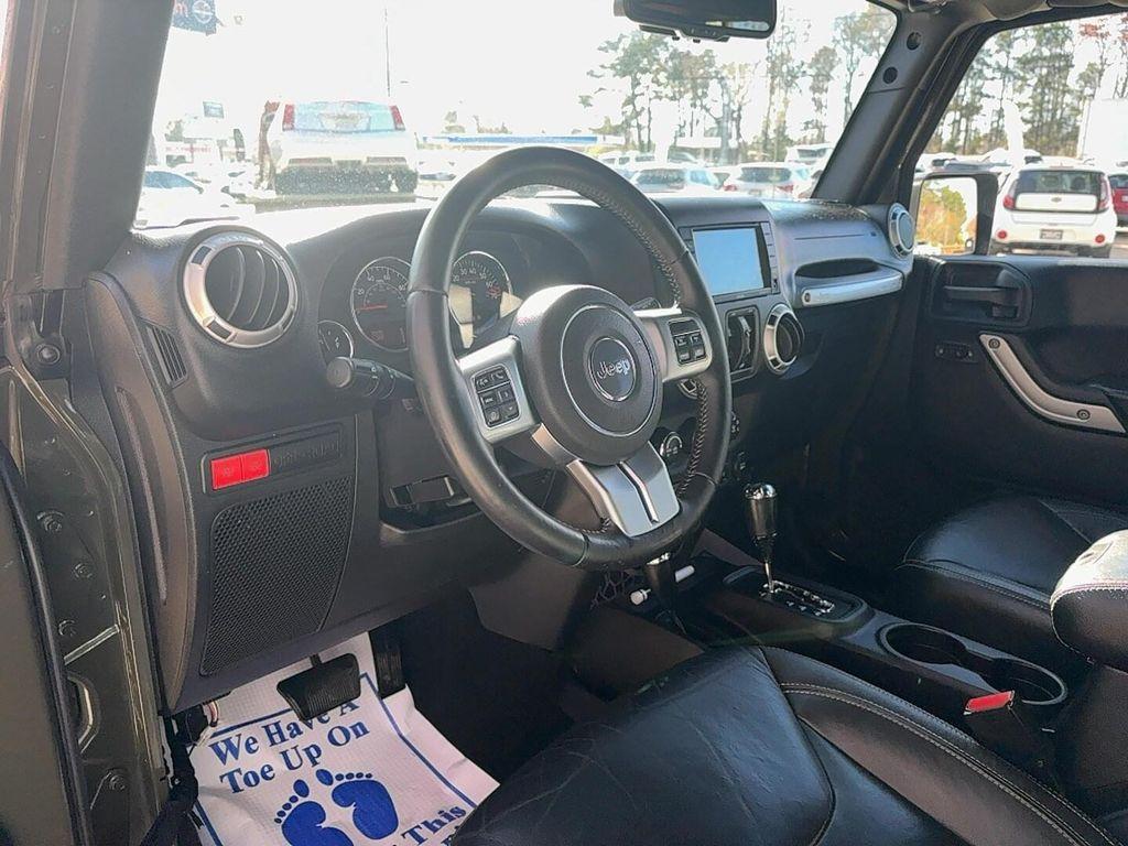 used 2015 Jeep Wrangler Unlimited car, priced at $13,900