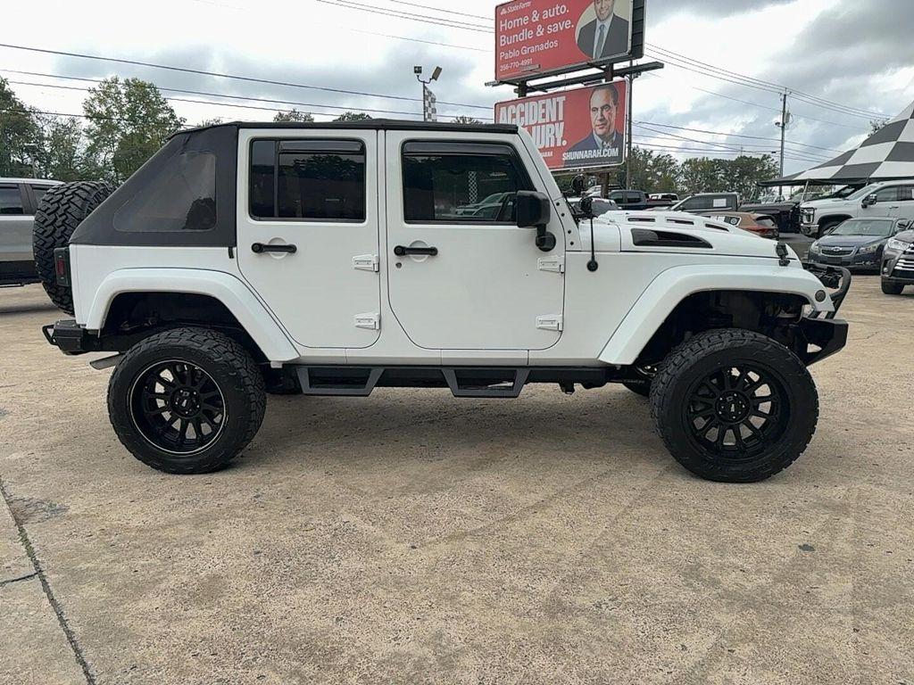 used 2012 Jeep Wrangler Unlimited car, priced at $12,900