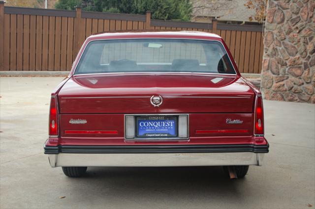 used 1985 Cadillac DeVille car, priced at $6,999