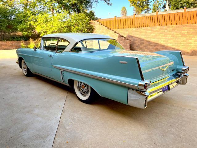 used 1957 Cadillac DeVille car, priced at $49,999