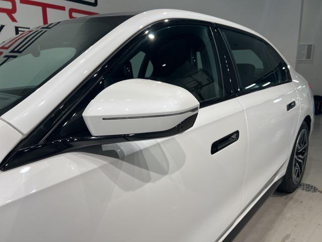 used 2024 BMW 740 car, priced at $74,460