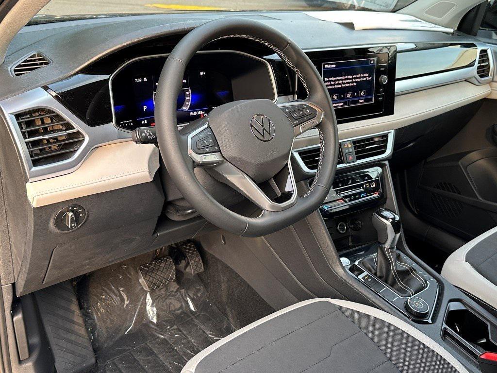 new 2025 Volkswagen Taos car, priced at $30,937