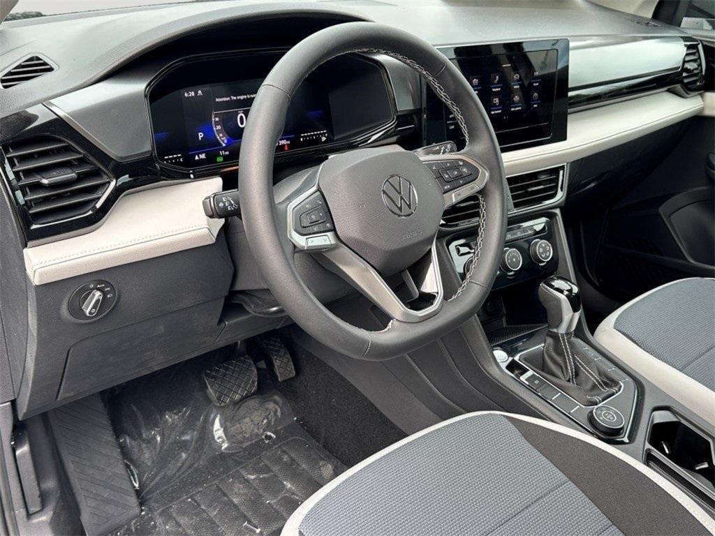new 2025 Volkswagen Taos car, priced at $27,305