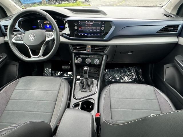 used 2023 Volkswagen Taos car, priced at $22,615