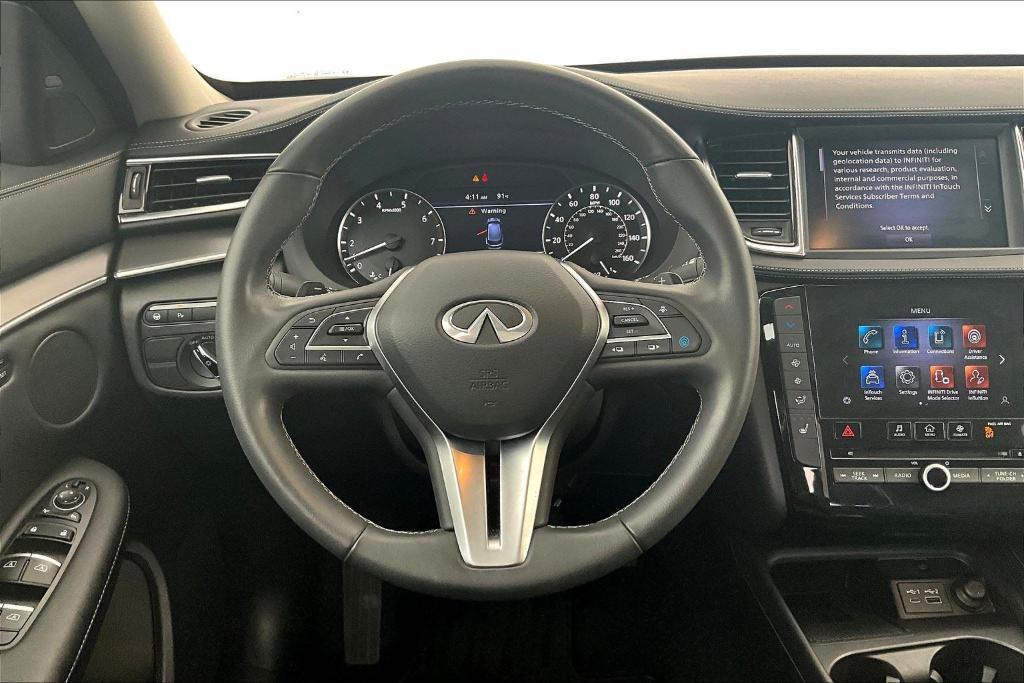 used 2025 INFINITI QX50 car, priced at $36,500