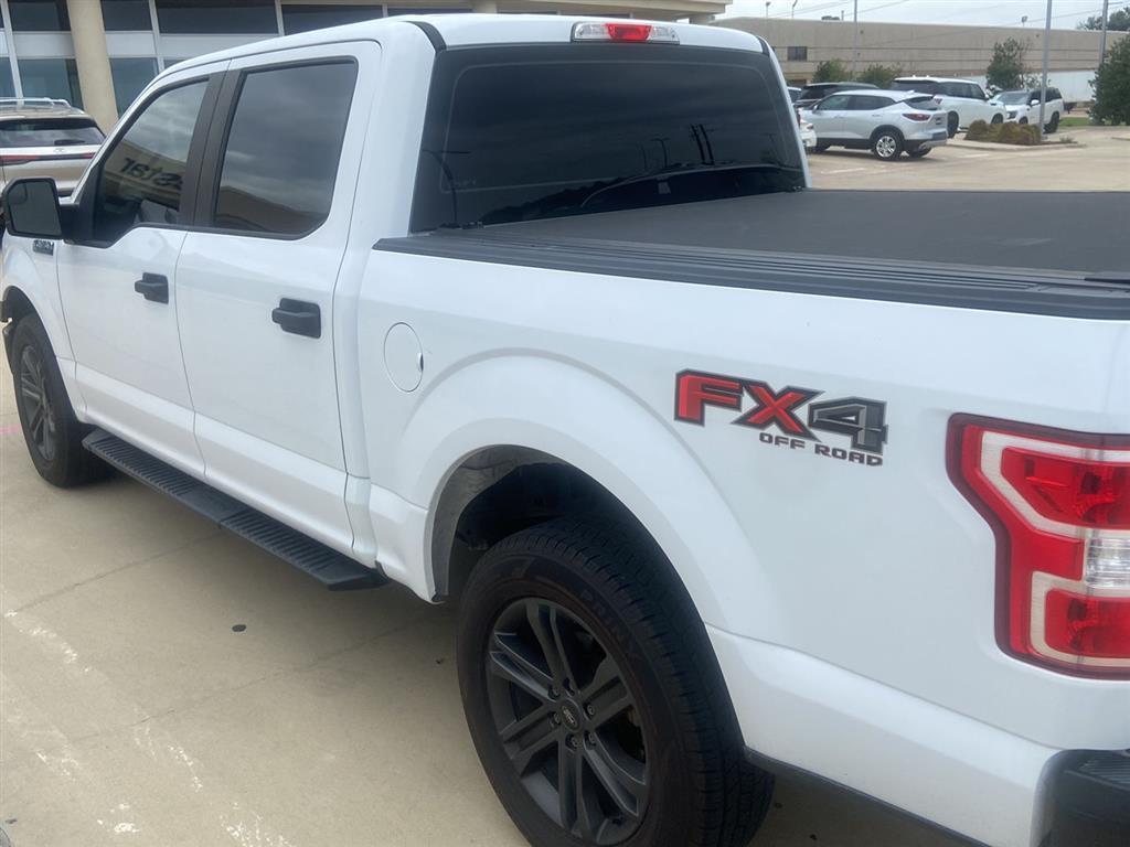 used 2018 Ford F-150 car, priced at $18,000