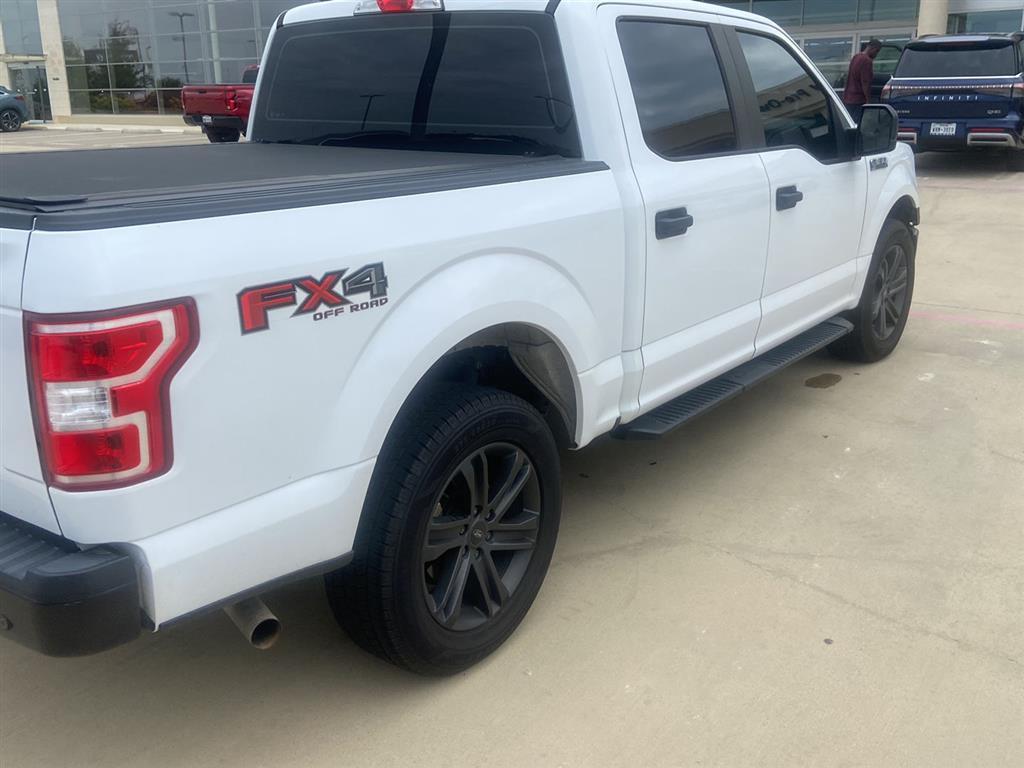 used 2018 Ford F-150 car, priced at $18,000