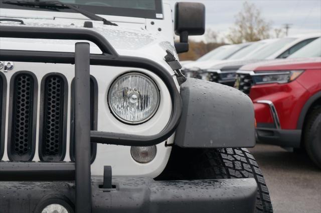 used 2018 Jeep Wrangler JK Unlimited car, priced at $25,319