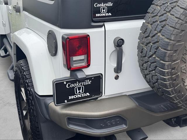 used 2014 Jeep Wrangler Unlimited car, priced at $18,535