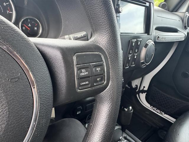 used 2014 Jeep Wrangler Unlimited car, priced at $18,535