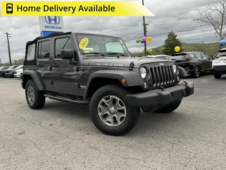 used 2014 Jeep Wrangler Unlimited car, priced at $24,799