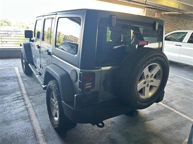 used 2014 Jeep Wrangler Unlimited car, priced at $16,226