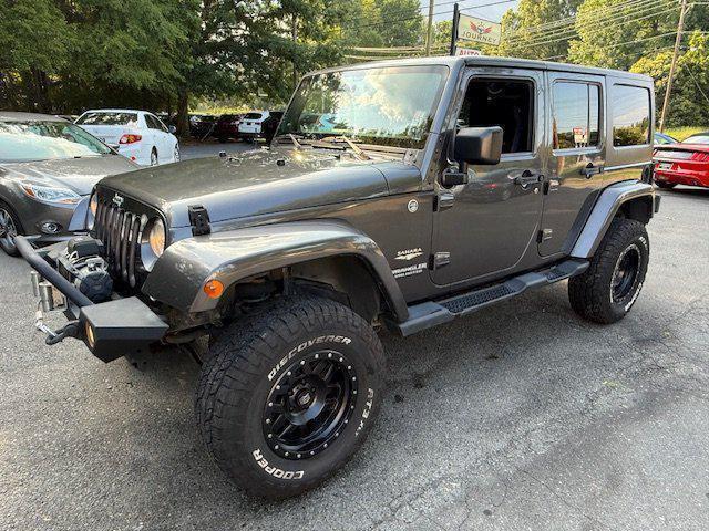 used 2014 Jeep Wrangler Unlimited car, priced at $17,997