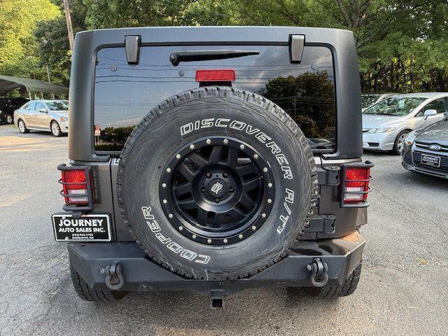 used 2014 Jeep Wrangler Unlimited car, priced at $17,997