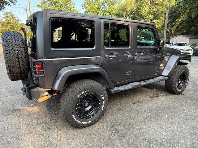 used 2014 Jeep Wrangler Unlimited car, priced at $17,997