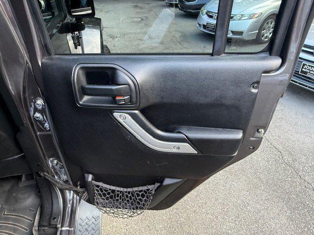 used 2014 Jeep Wrangler Unlimited car, priced at $17,997