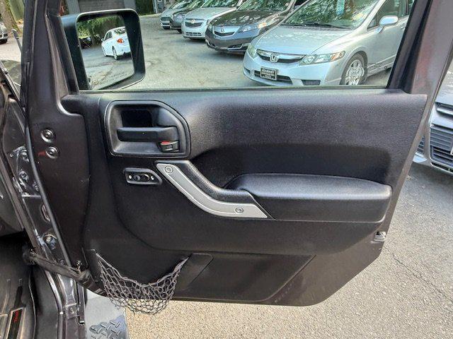 used 2014 Jeep Wrangler Unlimited car, priced at $17,997