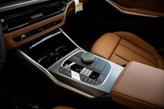 new 2025 BMW 330 car, priced at $50,150