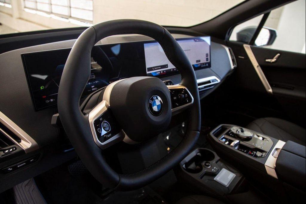 new 2026 BMW iX car, priced at $96,475