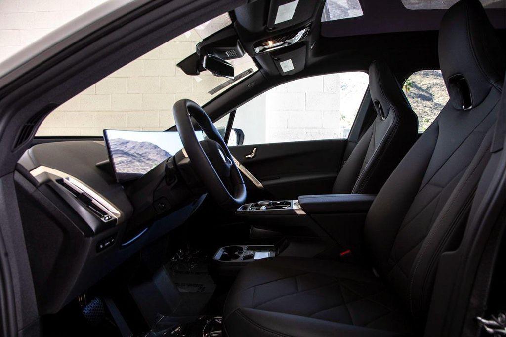 new 2026 BMW iX car, priced at $96,475