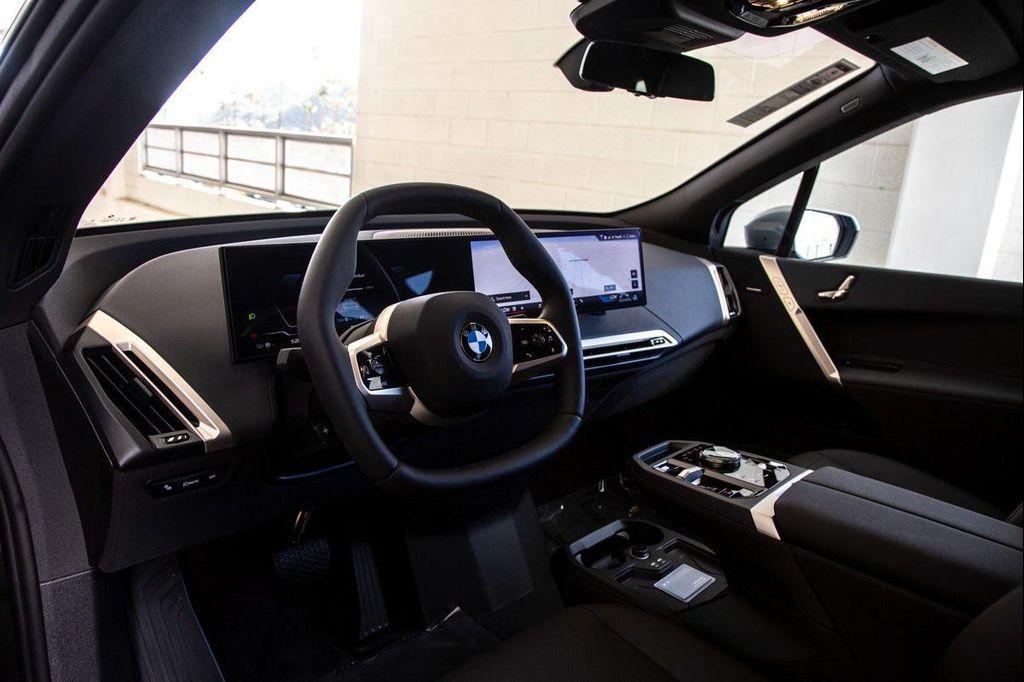 new 2026 BMW iX car, priced at $96,475