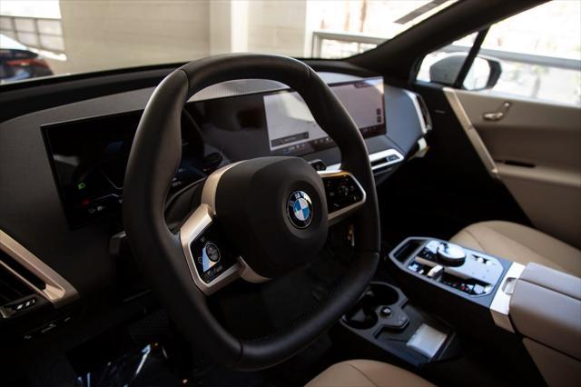new 2026 BMW iX car, priced at $79,650